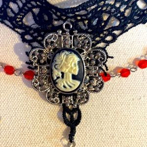 Black lace choker with peaks, cream cameo & beads